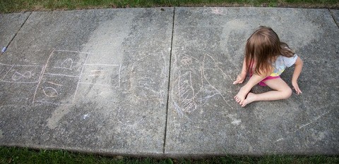 color photo for header, child on sidewalk with chalk, hopscotch, naperville child photographer
