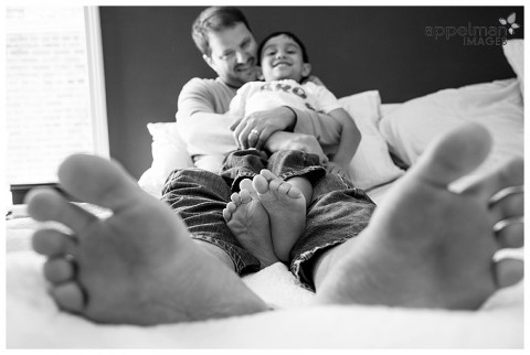 Photojournalistic Family Photography in Naperville, father son footsie angle