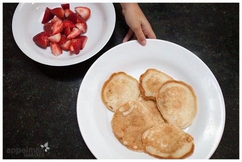 Documentary On Location Family Photography in Naperville Little  Breakfast Stealer