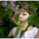 Custom Photographer for Families in Naperville Sweet girl spying in the lilacs 133-365 2014