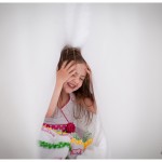 Naperville Child Photographer little girl in white and ruffles laughing 137-365 2014