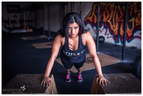 Determined Woman in crossfit gym in Naperville in a rad custom gym photoshoot