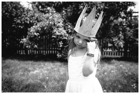 Dramatic little girl make believe as Frozen Queen Elsa for personal Naperville photo shoot