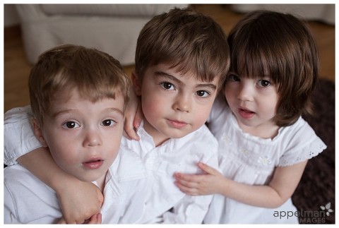 Beautiful lifestyle portrait of three children dressed in white by Naperville Child Photographer