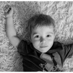 Sweet portrait of a little boy in his family home by Naperville Family Photographer