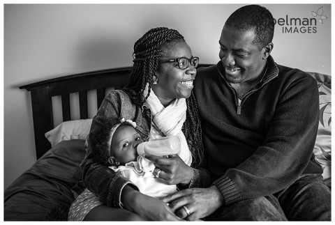 family time with new baby in black and white photo by naperville lifestyle photographer