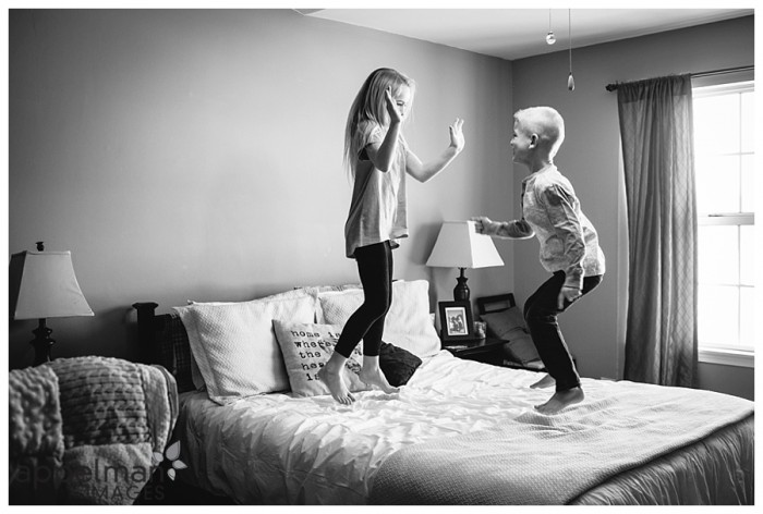 Kids jumping on the bed oswego family photos