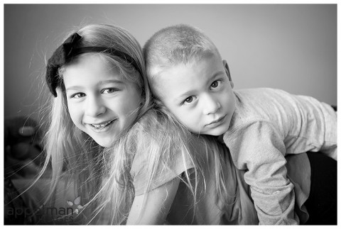 Siblings boy and girl in lifestyle portraits