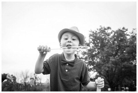 bubbles and the boy in black and white in naperville family lifestyle photography