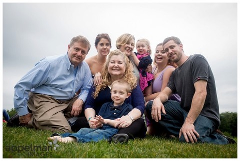 family all together in lifestyle photography portrait in naperville outdoors downtown