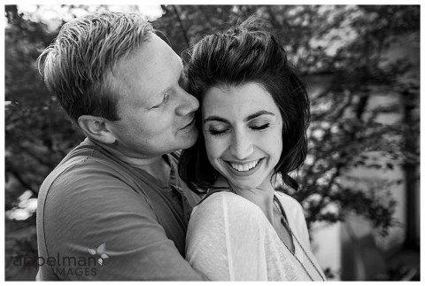 Black and white photo of couple snuggling lifestyle photo