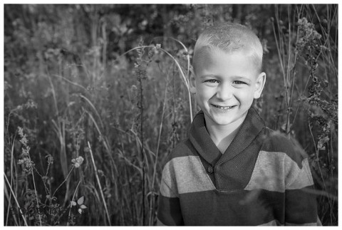 Handsome boy in outdoor mini session black and white portrait