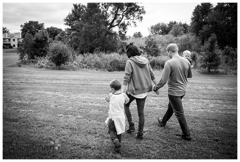 walking in the field by naperville natural style photographer