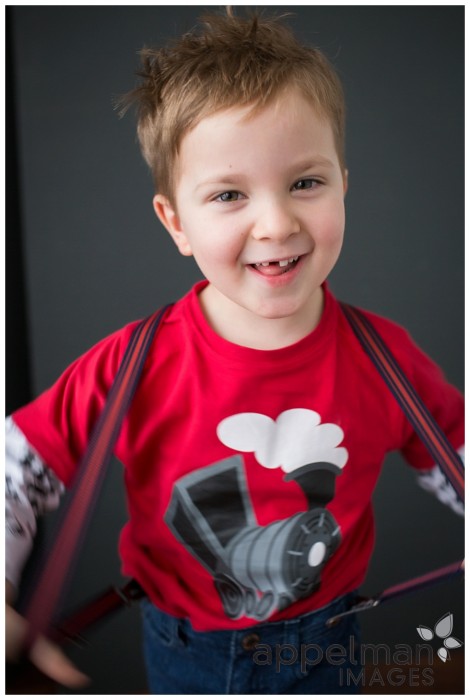 Four years old sweet boy in red train shirt naperville kids photographer