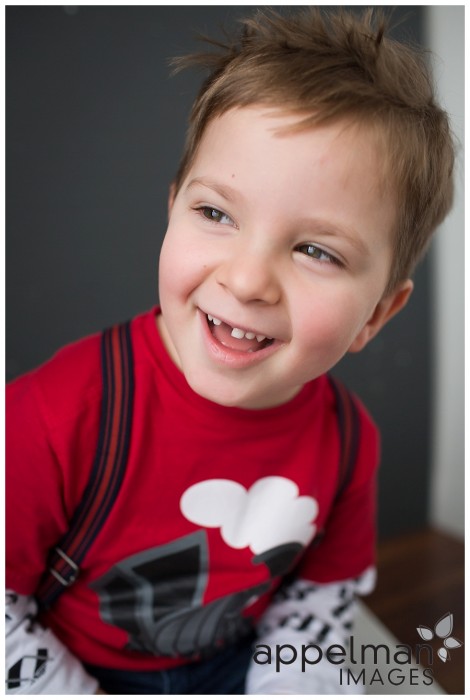 naperville studio photographer for kids little boy with suspenders